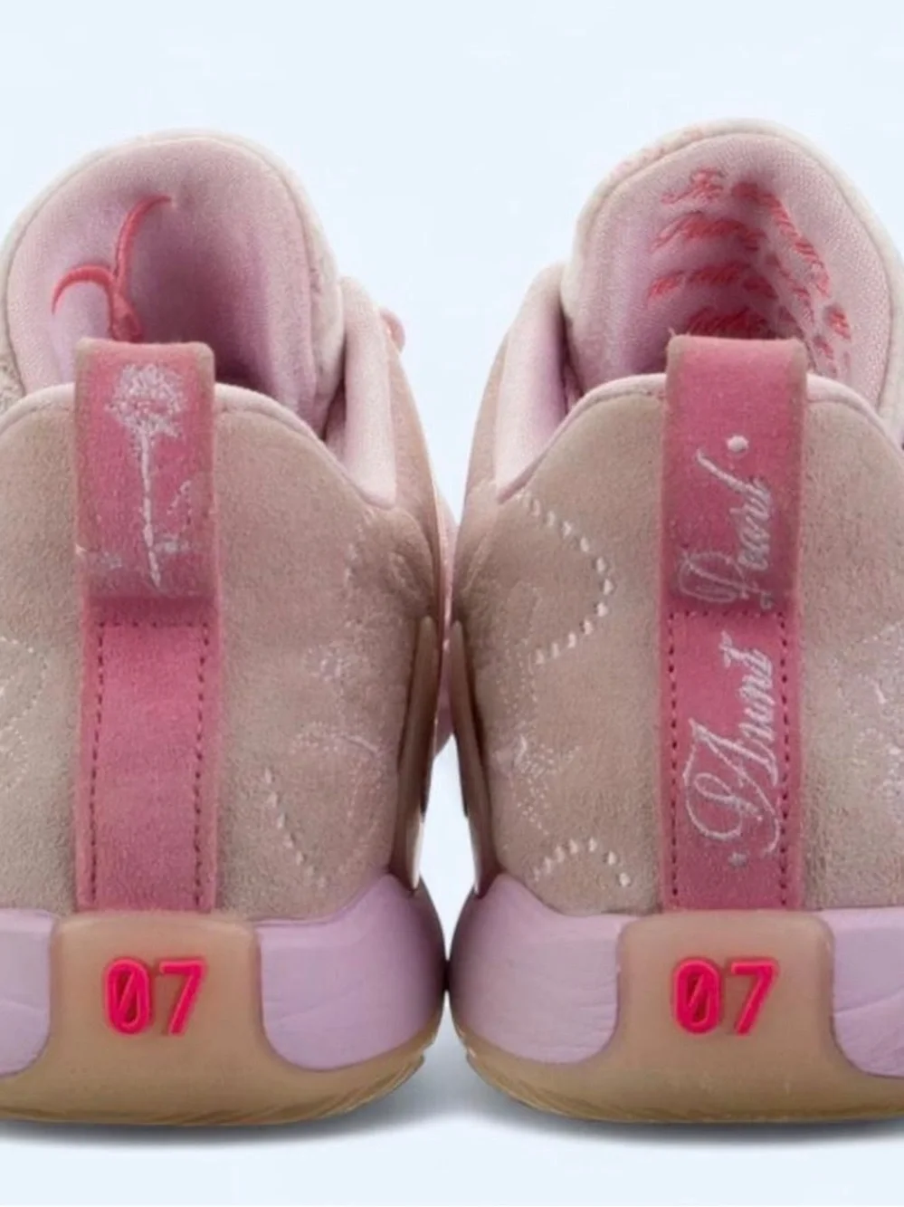 Nike Pink Low-Top Athletic Shoes with Subtle Hot Pink Accent